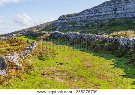 Hiking Trail With Stone Walls In Burren Mountains