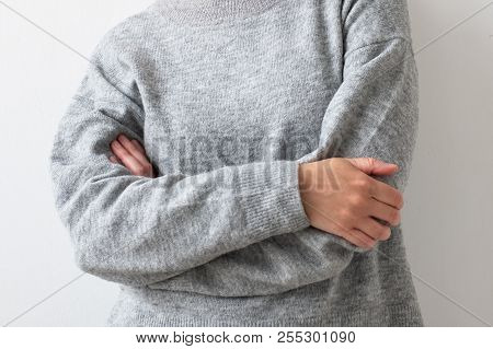 Cropped Photo Of Caucasian Woman Crossing Her Hands Dressing Gray Pulover.