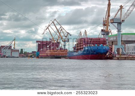Saint Petersburg, Russia - July 07, 2017: The Background, The Completion Wall Of The Baltic Shipyard