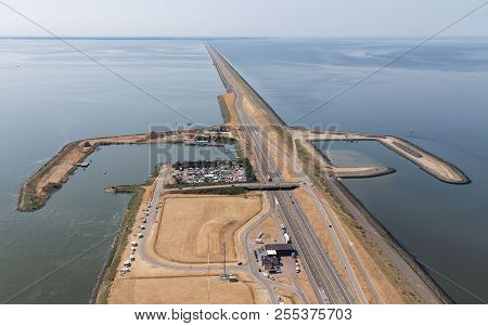 Aerial View Dutch Dike Afsluitdijk Between Ijsselmeer And Wadden Sea