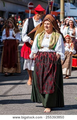Sardinia, Italy. Feast Of The Redeemer, Traditional Costumes Parade.