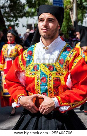 Sardinia, Italy. Feast Of The Redeemer, Traditional Costumes Parade.