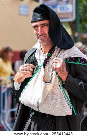 Sardinia, Italy. Feast Of The Redeemer, Traditional Costumes Parade.