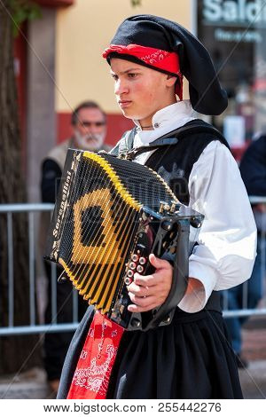 Sardinia, Italy. Feast Of The Redeemer, Musicians At The Parade Of Traditional Costumes