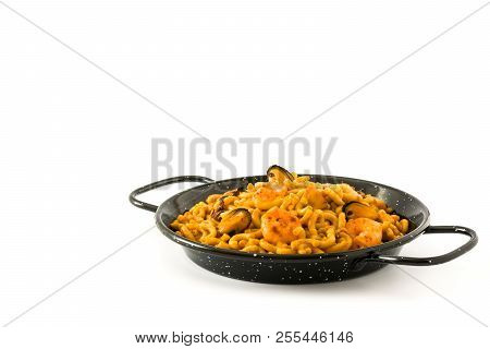 Traditional Spanish Fideua. Noodle Paella Isolated On White Background. Copyspace