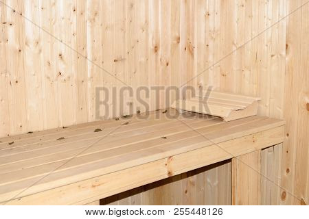 Interior Of A Wooden Sauna With A Sun Bed And A Headrest