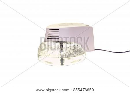 The Working, Contemporary Humidifier And Ionize On White Background Close-up