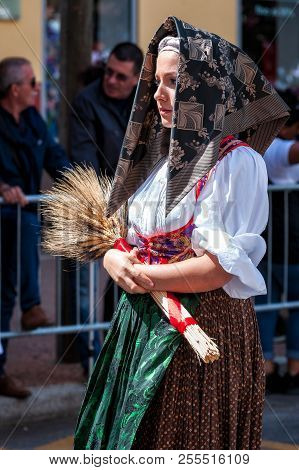 Sardinia, Italy. Feast Of The Redeemer, Traditional Costumes Parade.