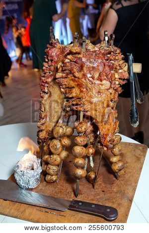 Many Cooking Traditional Turkish Roasting Lamb Barbecues.roasted Meat Over An Open Fire, Cooked In A