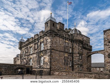 Edinburgh, Scotland, Uk - June 14, 2012: Brown Gray Stone Royal Palace With Golden Decorations And G