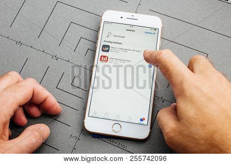 Paris, France - Sep 26, 2016: Male Hand Holding New Apple Iphone 7 8 Plus Smartphone After Unboxing 