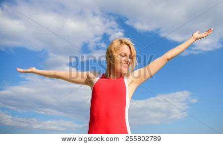 Girl Pleased With Freedom Looks Relaxed Carefree Blue Sky Background. Feel Harmony And Peace. Take I