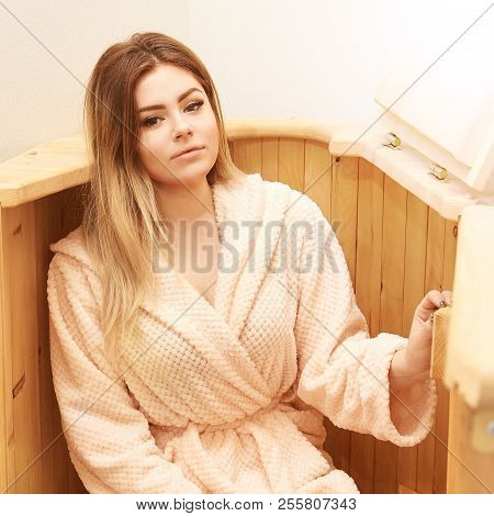 Healing Spa Treatment. Cedar Barrel. Young Beautiful Girl. Health Accessories. Salon Procedure