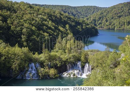 Landscape With Beautiful Luxuriant Nature And Waterfalls At 