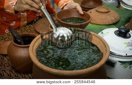 Closeup Grass Jelly Green Cincau On Traditional Pottery Served In Traditional Market In Central Java
