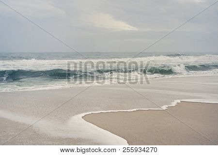 Artistic Trealtment Of Beach Landscape Seascape. Foggy Overcast Day, Lush Muted Coloring.