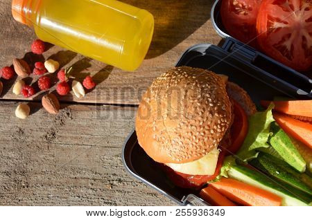 Lunch Boxes With Food Ready To Go For Work Or School, Meal Preparation Or Dieting Concept. Hamburger