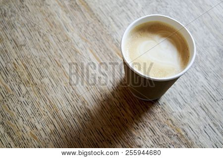 Cappuccino Coffee Cup On Wooden Table