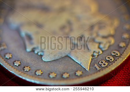 Liberty Silver Dollar Minted In The Year 1899.