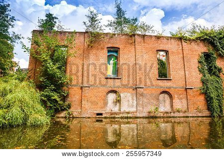 The Wall Of Old Building With Naked Man Picture In Ghent, Belgium.