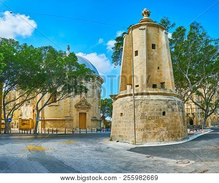 The Notable Landmarks Of Floriana - Wignacourt Water Tower And Sarria Church On Background, Malta.