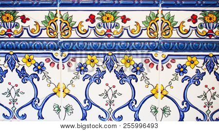 Detail of the traditional tiles from facade of old house. Decorative tiles.Spain traditional tiles. 