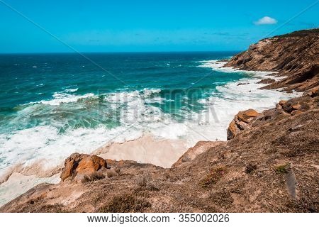 The Indian Ocean And Waves Breaking On The Shore Near Cape Agulhas, The Southernmost Point In Africa
