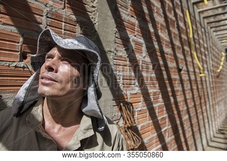 Penedo, Alagoas, Brazil - July 04, 2016: Mason At Work In A House Construction In A Small City Of No