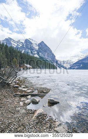 Mount Fairview, Partly Frozen Lake, Lake Louise Banff National Park, Alberta Canada