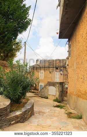 Looking through Little lane French village Casinca