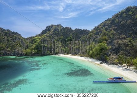 Top View Of The Horseshoe Island With White Sand Beach And Beautiful Coral Reef For Snorkeling In My
