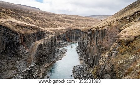 Studlagil Basalt Canyon, Iceland. This Is A Rare Volcanic Basalt Column Formation