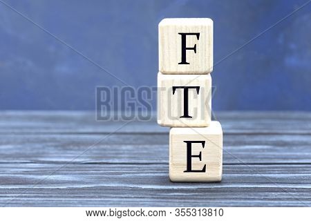 Concept Word Fte On Cubes On A Beautiful Gray Blue Background