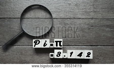 Inspirational Of Pi Day Celebration - Text Pi=π=3.142 Written On Wooden Block