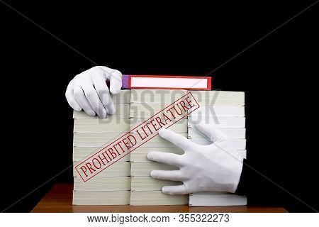 Concept Of Distribution Of False Literature, Forbidden Information, Extremist. Stack Of Books On A B