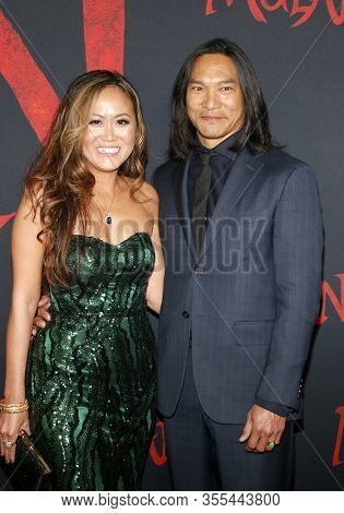 Jason Scott Lee and Diana Chan at the World premiere of Disney's 'Mulan' held at the Dolby Theatre in Hollywood, USA on March 9, 2020.