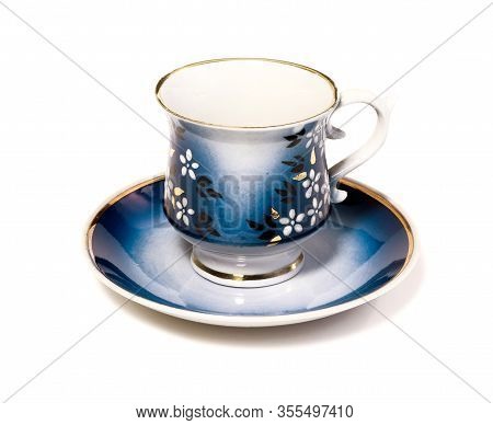 Blue Coffee Cup With Saucer Isolated On A White Background.