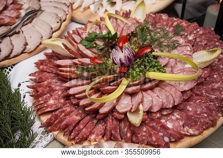 Party Meat Catering Table. Wedding Decorative Meat Food Table. Various Meat Snacks Background. Salam