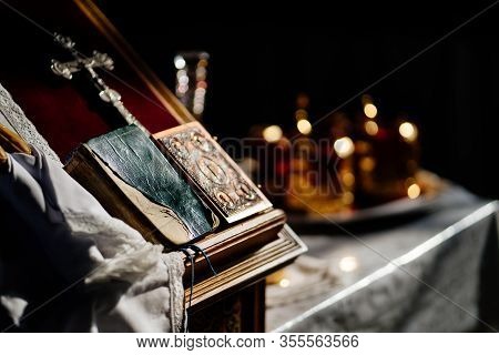 Missal For The Sacrament Of Wedding On  Ambo In The Church. Crowns