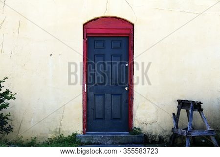 Black Door Red Trim Vintage Workshop Entrance