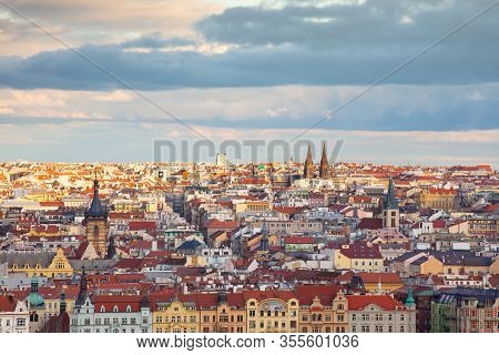 Panorama Of Prague City In Sunset. Aerial Panoramic View Of The Histrical Roofs. Prague, Czech Repub