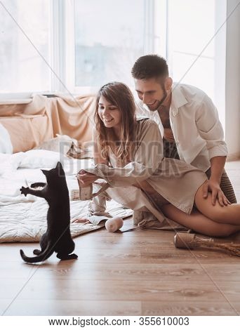 Stock photo - Portrait of happy loving couple at home