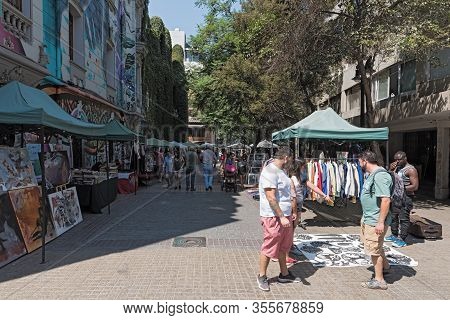 Shoppers And Street Vendors In A Pedestrian Area Of Santiago, Chile