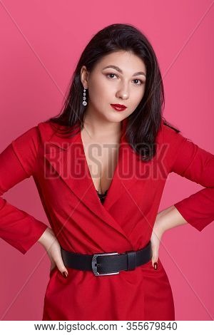 Close Up Portrsit Of Beautiful Young Woman Wearing Elegant Redd Dress With Black Belt Posing With Ha