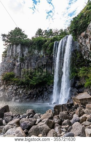 Epic View Of High Sojeongbang Waterfall On Jeju Island, South Korea.