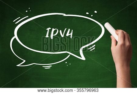 Hand drawing IPV4 abbreviation with white chalk on blackboard