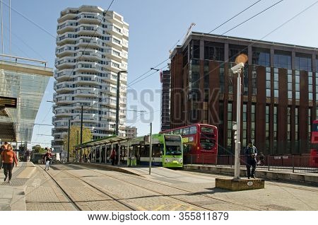 Croydon, Uk - October 2, 2019:  Travellers Using The Various Transport Offerings Outside East Croydo