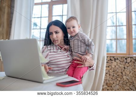 Mom Busy Working, Daughter Interfering, Looking For Attention