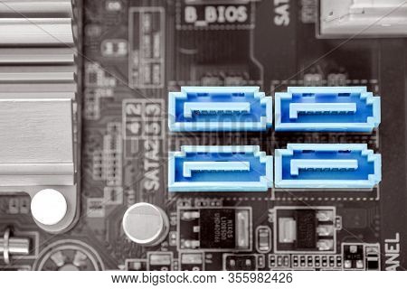 Blue Color 4x Sata-ii Port In Desktop Pc Motherboard On Black And White Color Filter, Sata-ii Is A P