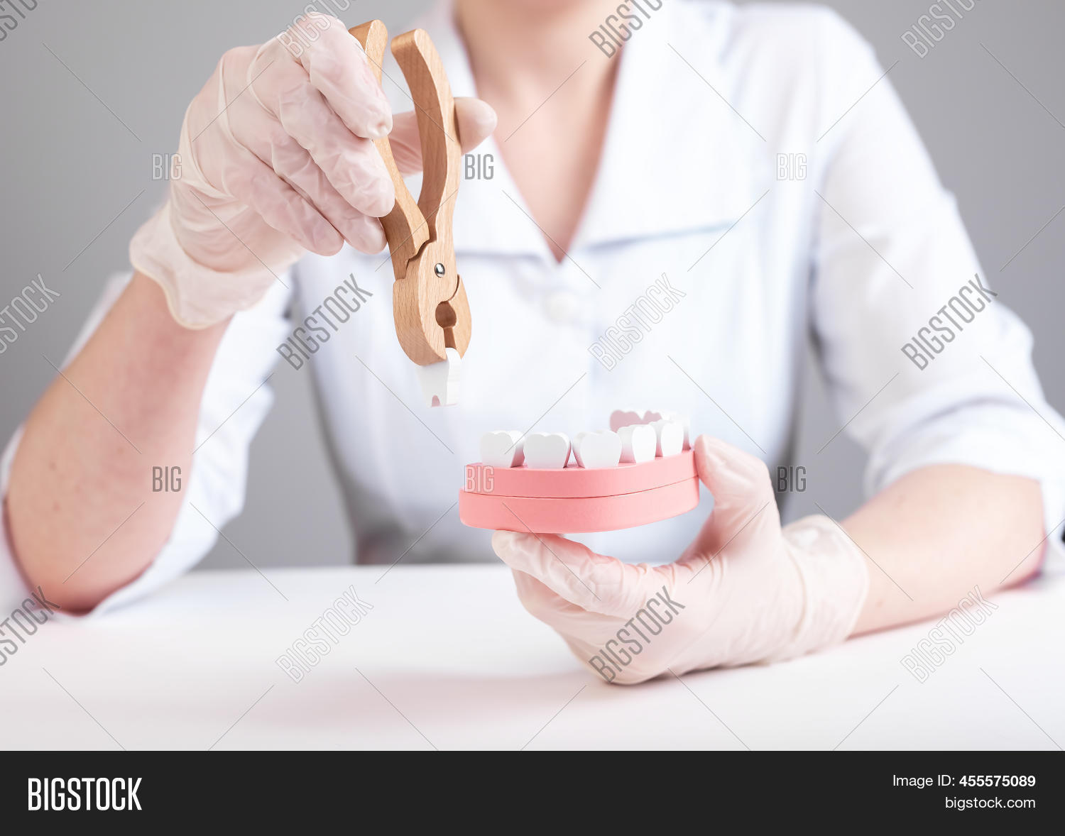 Dentist Pulling Tooth Image & Photo (Free Trial) Bigstock